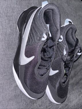Nike- Team Hustle D10 Black and Silver Athletic Sneakers with Neon Green Insole